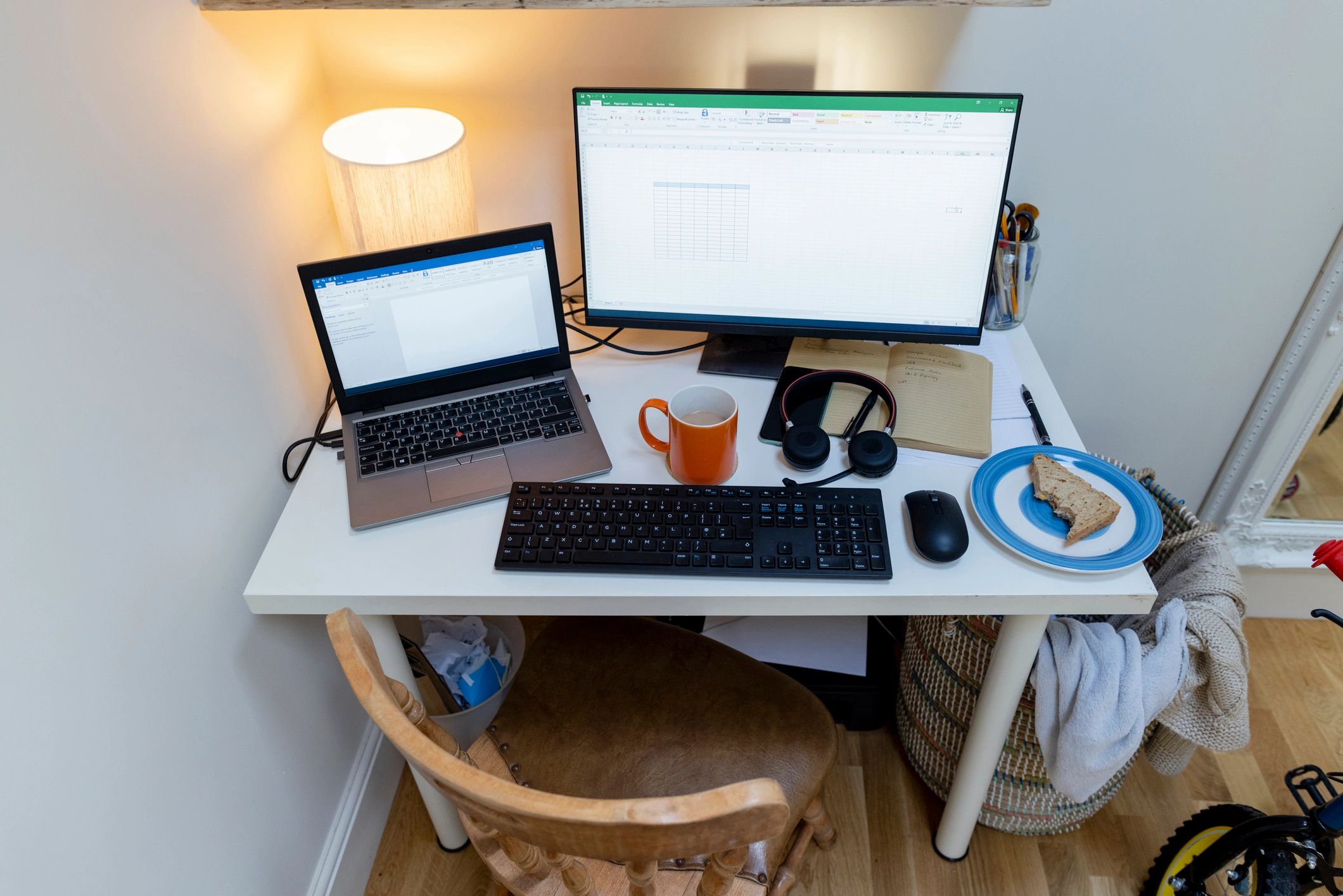 Home office desk with dual monitors and a clean workspace